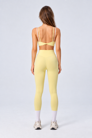 WEARHUB Nylon-Spandex Color-Block Layered-Look Sports Bra — Light Yellow, back view