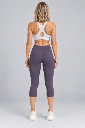 WEARHUB Polyester-Spandex Sculpting Pocket Capri Leggings — Starry Black, back view