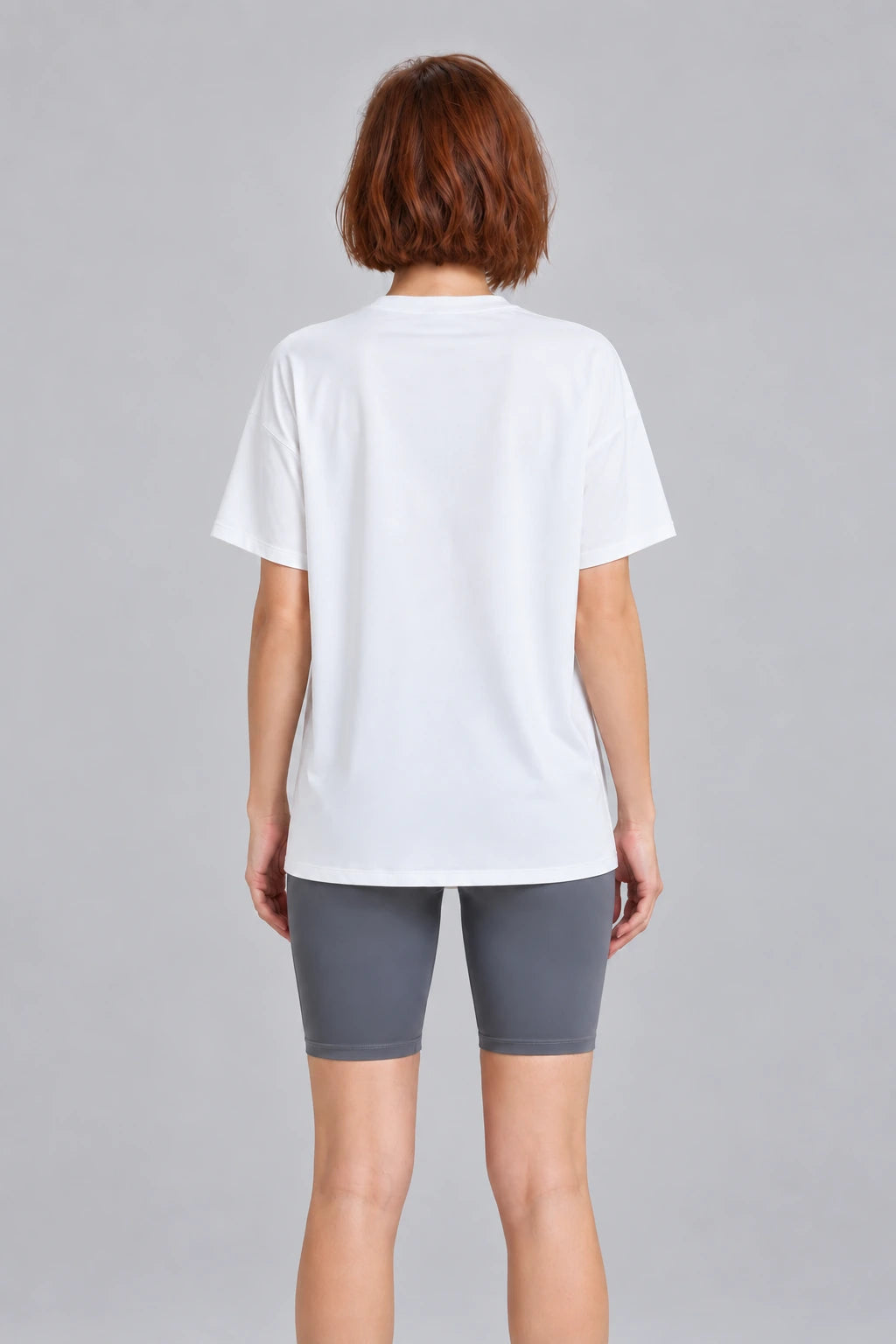 WEARHUB Polyester-Spandex Slit-Detail Relaxed Short-Sleeve Top — Black, back view
