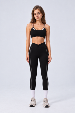 WEARHUB Nylon-Spandex Color-Block Layered-Look Sports Bra — Black, front view