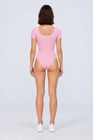 WEARHUB Nylon-Spandex Stretch Short-Sleeve Active Bodysuit — Pink, back view