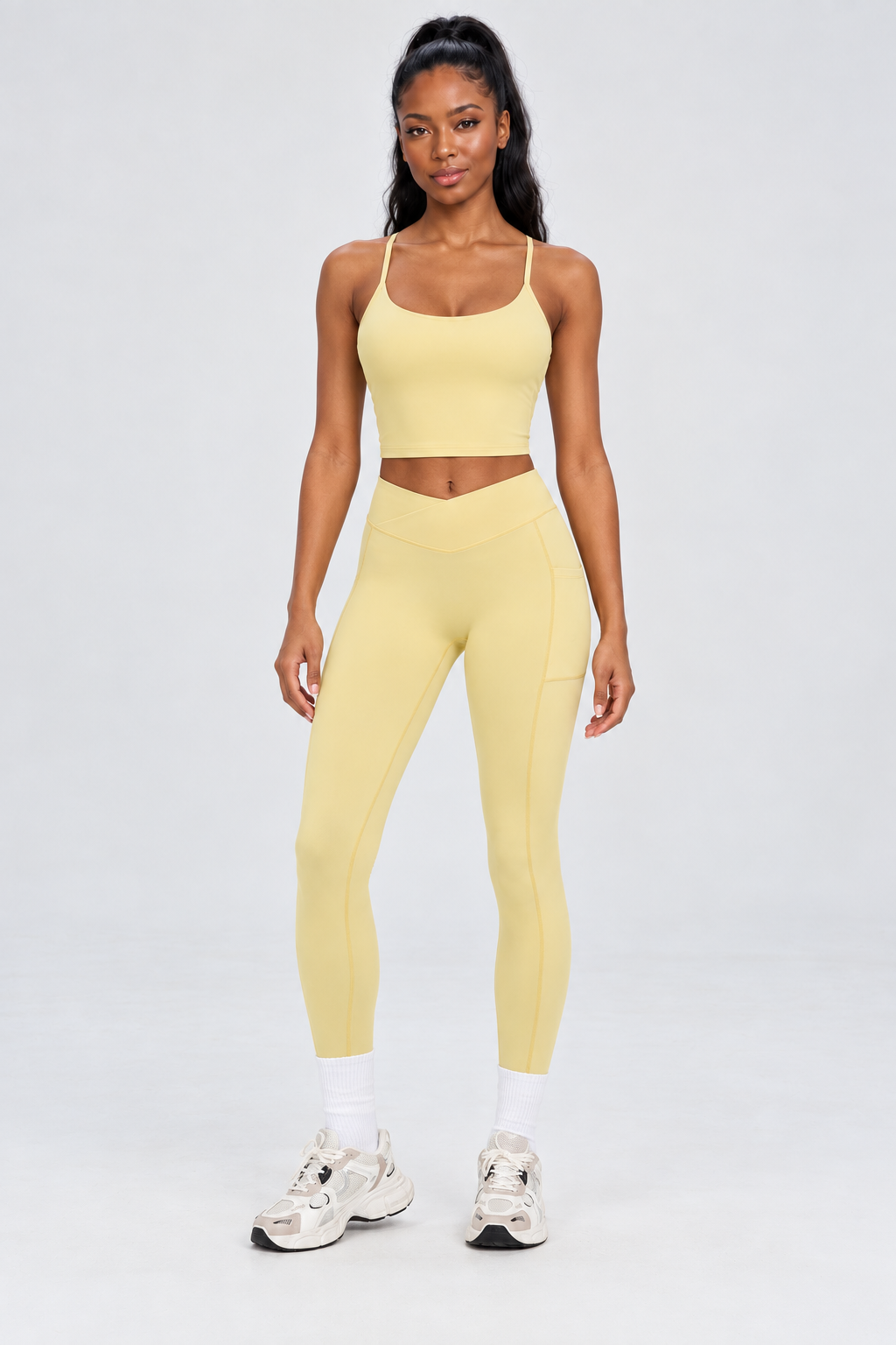 WEARHUB Nylon-Spandex Crisscross Cutout Active Tank — Light Yellow, front view