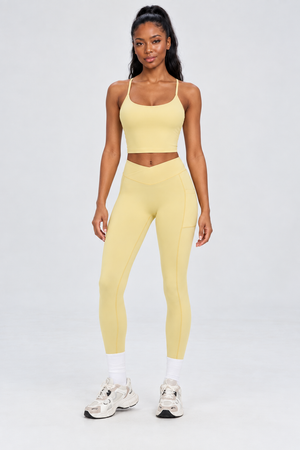 WEARHUB Nylon-Spandex Crisscross Cutout Active Tank — Light Yellow, front view