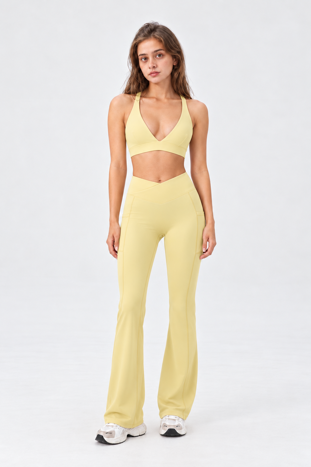 WEARHUB Nylon-Spandex Deep-V Crisscross Sports Bra — Light Yellow, front view