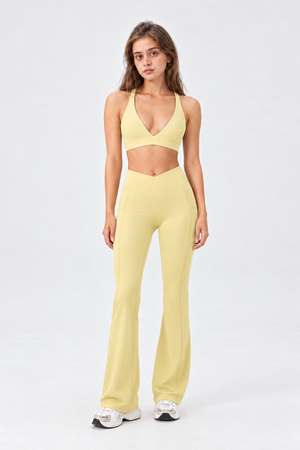 WEARHUB Nylon-Spandex Deep-V Crisscross Sports Bra — Light Yellow, front view