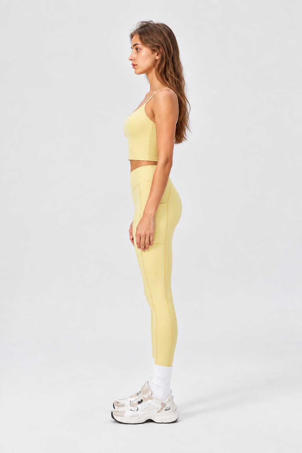 WEARHUB Nylon-Spandex High-Waist Crossover Active Leggings — Light Yellow, side view