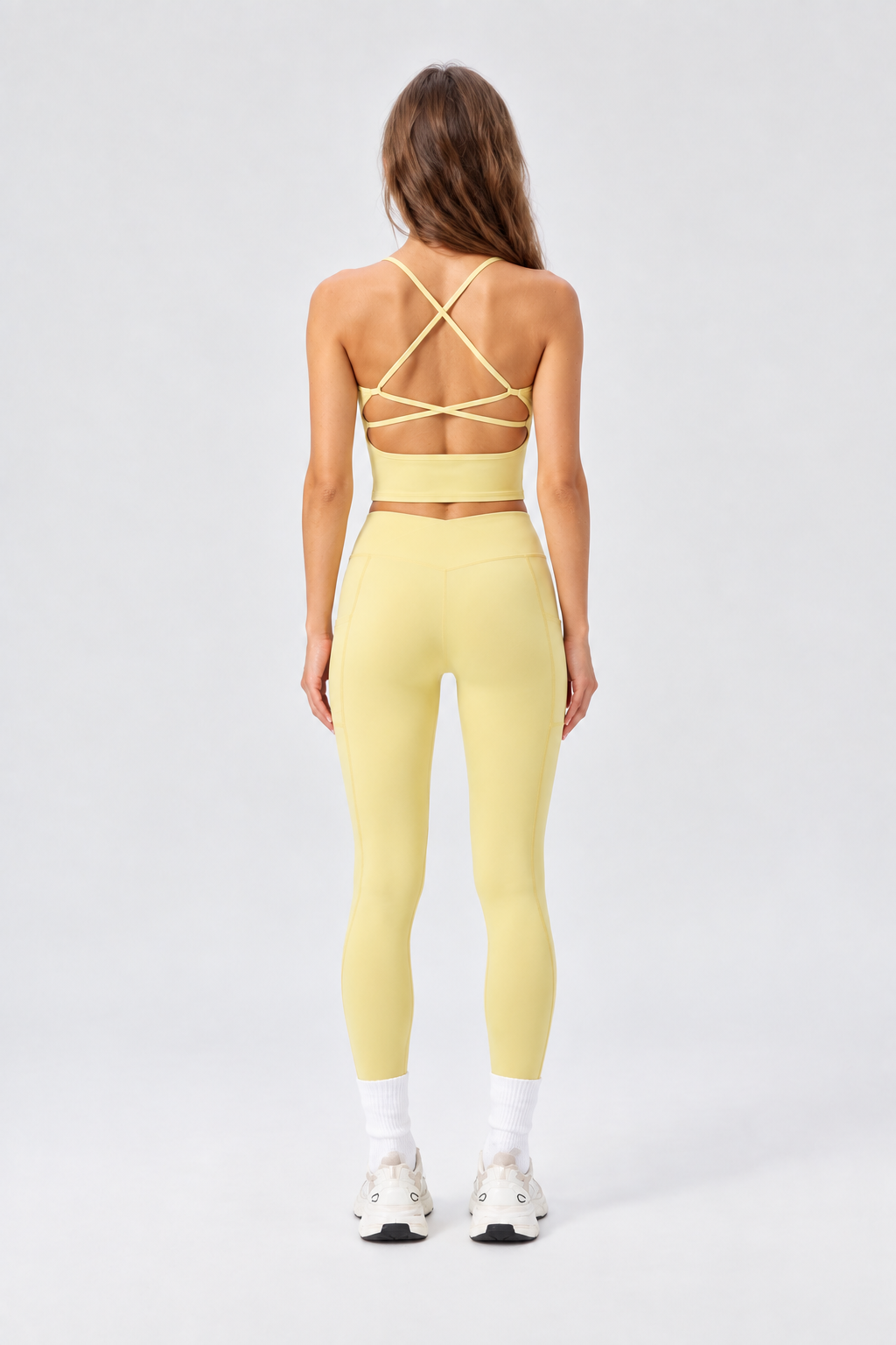 WEARHUB Nylon-Spandex High-Waist Crossover Active Leggings — Light Yellow, back view