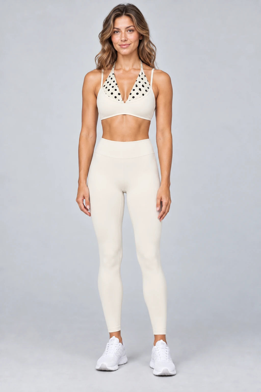 WEARHUB Polyester-Spandex Printed Sports Bra — WHZ087 — Milky White with Black Polka Dots, color front view